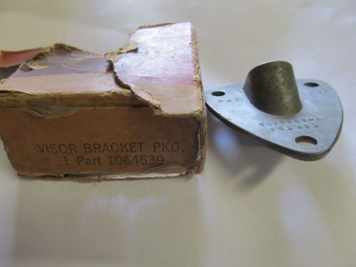 Nos sun visor bracket kit, mopar #1064539, part dated 1937.
