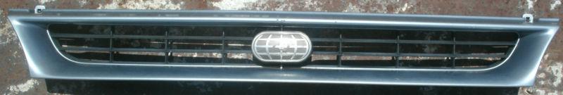 1991 91 1992 92 geo prizm front grille grill assembly with emblem light blue oem