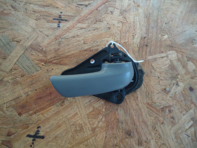 Passenger right side interior door handle assembly gray caravan 96-2000 05022