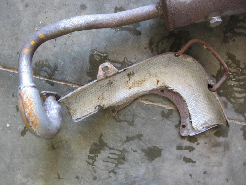 Sell 1986 Suzuki LT50 LT 50 4 wheeler exhaust pipe muffler heat shield