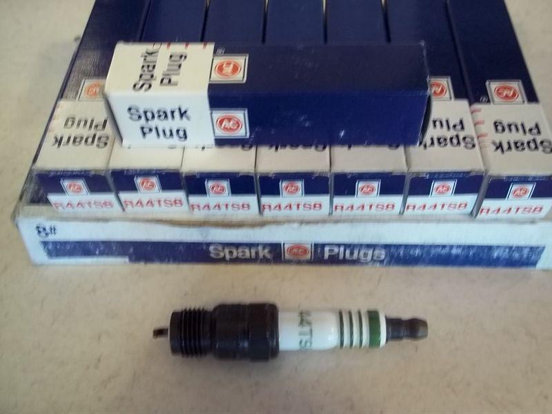 Old stock #r44ts8 with green stripes ac delco#. 5613794 mfg usa set of 8