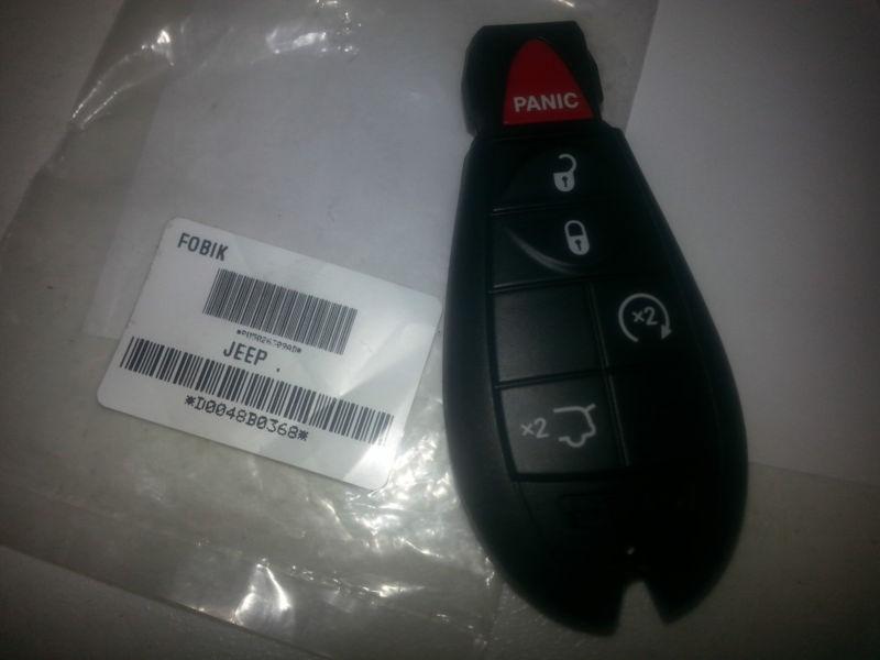 Sell NEW OEM JEEP FOB KEYLESS ENTRY SMART KEY REMOTE CHEROKEE COMMANDER
