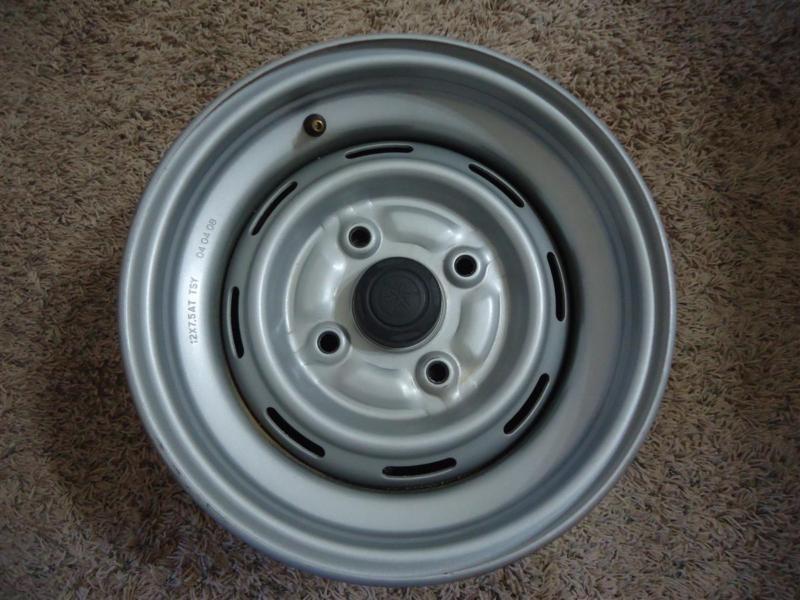 2008 fourwheeler factory rim 12x7.5 wheels