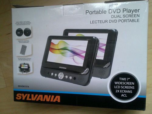 Sylvania pair ( two ) 7 inch screens with 1 dvd player.