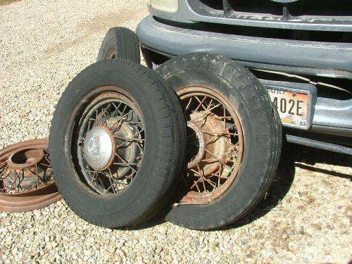 Old antique car parts a set of 4 1930&#039;s ford flathead 17 inch  spoke wheels