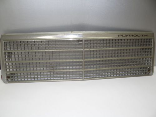 Vintage used old plastic plymouth chrysler car automobile front grill part