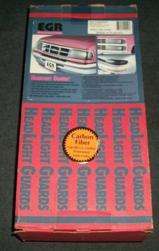 Egr headlight guards,carbon fiber look,94-96 chevy/gmc pick up and suv,121220