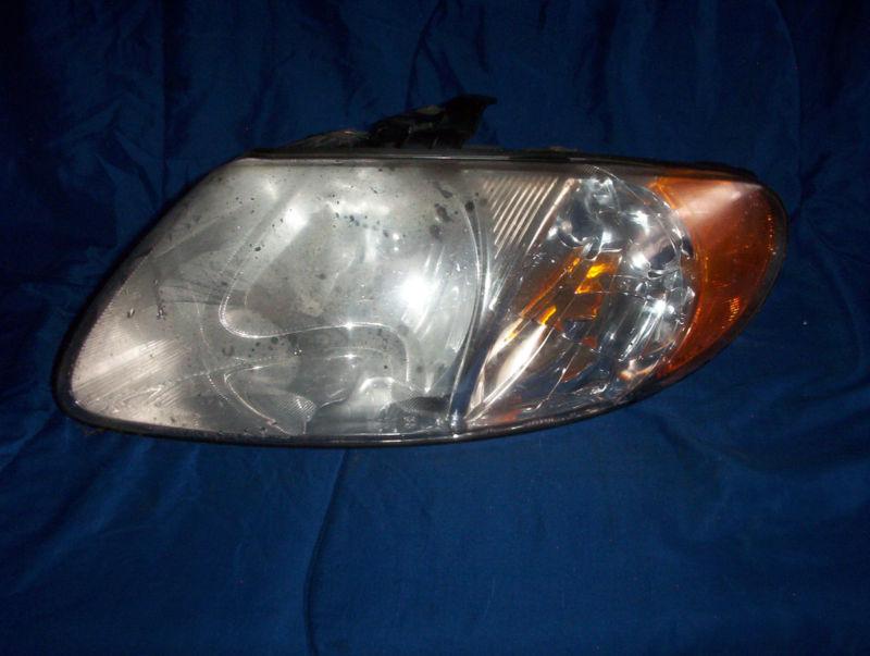 Purchase LEFT HEADLAMP ASSEMBLY DODGE CARAVAN 2005 in Palmerton