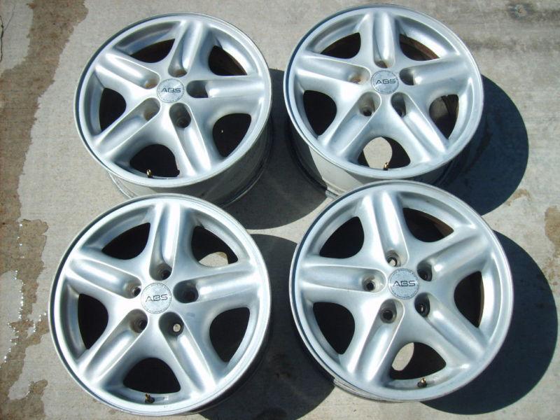 Set of 4 pontiac bonneville alloy 16 wheels rims with center caps