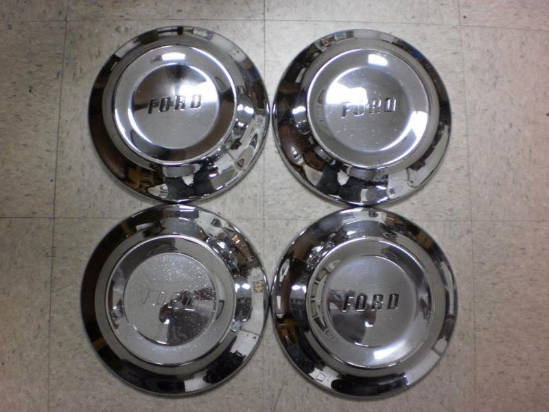 Ford hubcaps,1950's vintage,matching set of 4,oem,good driver condition!!!!