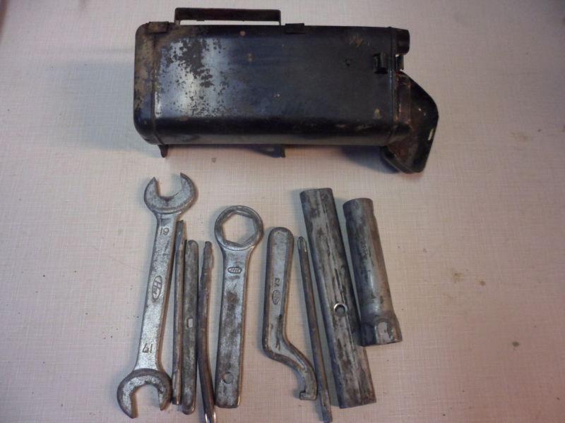 Honda sl350 sl 350 1970 tool box with the tools in it