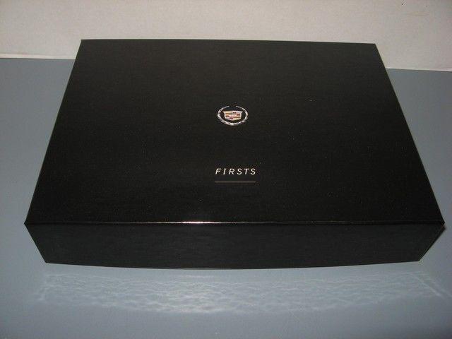 Cadillac firsts gift box includes evian facial mist altoids mints flashlight 