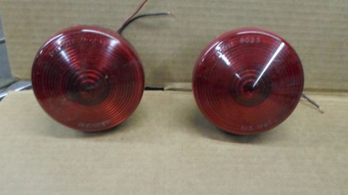 Brake and tailights,for trailer,used,original,working condition,round,plastic.