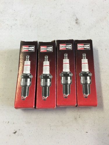 Champion spark plug j4c # 825 set of 4
