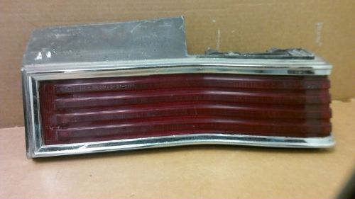 75&#039; - 79&#039; mercury grand marquis  rh tail light and chrome bezel  oem