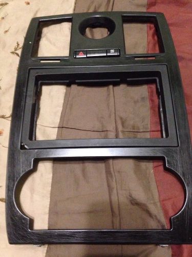 2005-2007 chrysler 300 c radio gps center faceplate for up to 7 in unit.