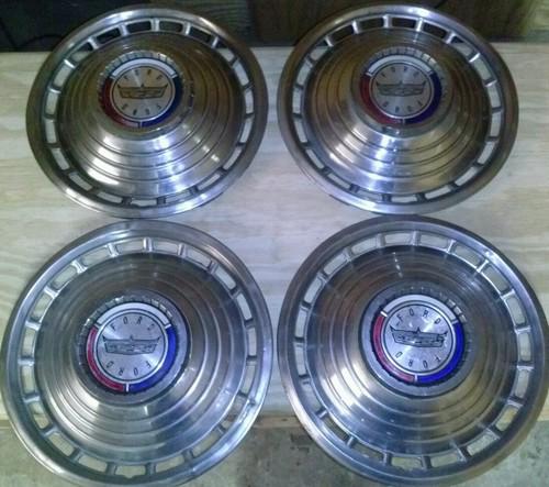 Ford 1963 14 inch hubcaps. set of 4 !!!!