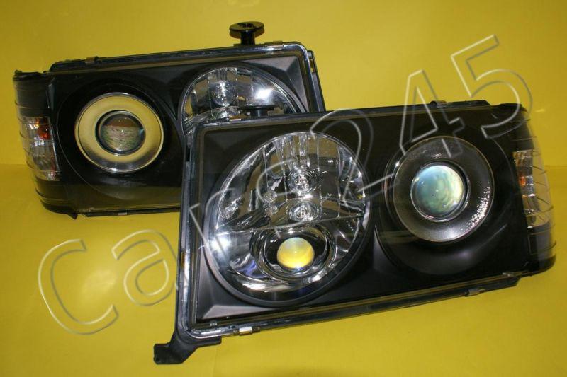 Mercedes w124 black front lamps headlights projectors lh + rh pair 1985-1993