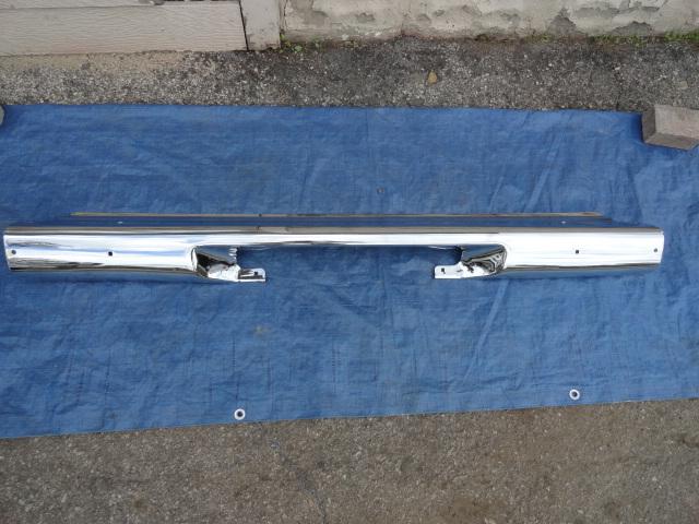 1995-96 mercury montego center rear bumper ( plated ) bright chrome.