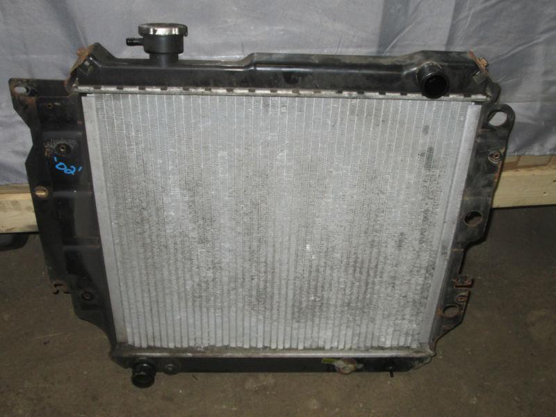 Find Jeep Wrangler TJ 9706 used radiator no leaks 2.5 L and 4.0 L in