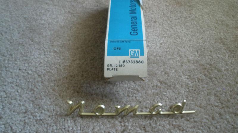 Nos 1957 chevrolet nomad tailgate emblem 3732860 new in box