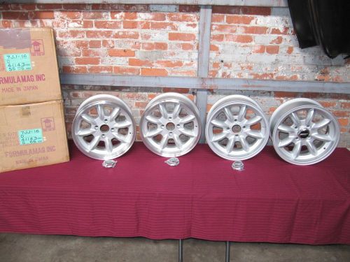 Four (4) new old stock panasport racing 16 x 7 wheels 4x114.3 pcd +0 offset