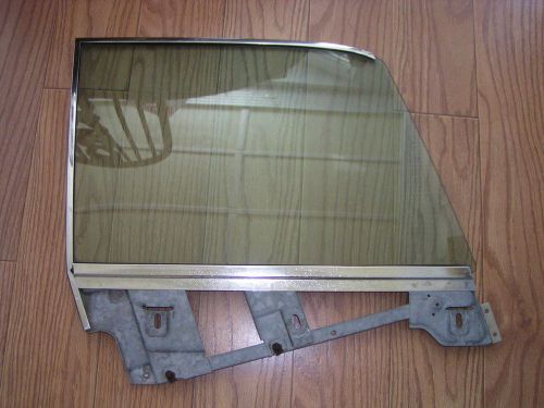 Vintage circa 1966 lincoln right front window with frame. 66