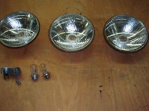 Mg tf lucas semi-sealed beam head lamps. used. (3)