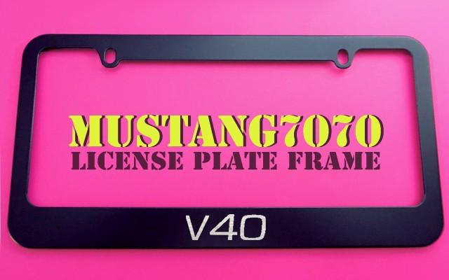 1 brand new v40 black metal license plate frame + screw caps