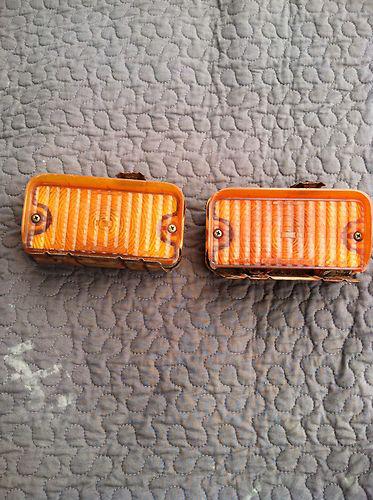 73 chevy impala caprice front bumper parking light bezels housings original