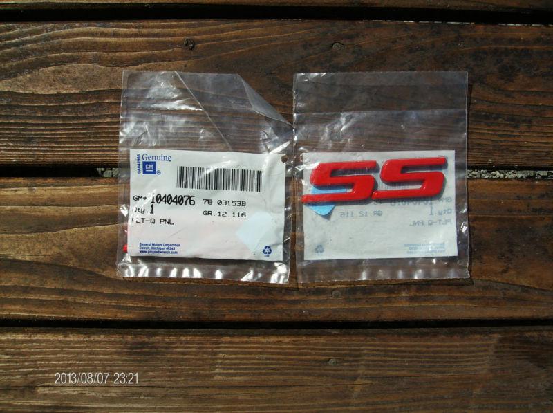 Pair of new 2000-2005 chevy monte carlo red ss emblems  pt#10404076