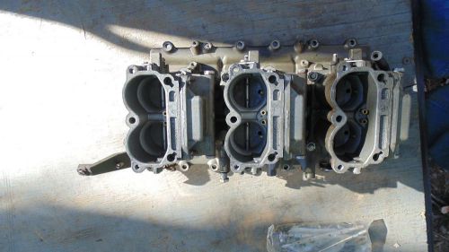 Vintage carb assy. with reed plate assy. from a 200 hp v6 in good condition