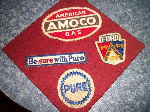 Four vintage auto products uniform patches