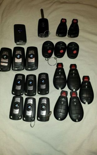 Oem lot of keyless key remote. .... bmw,ram,toyota,mercedes,volvo,acura.