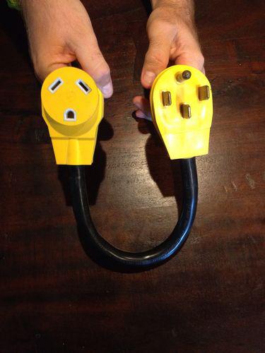 Camco power grip adaptor - 50amp male to 30amp female adaptor