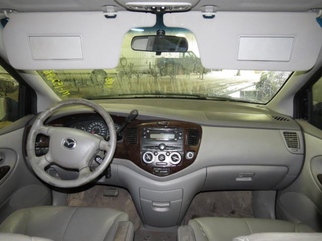 2000 mazda mpv van speedomter and radio trim dash bezel 2573393