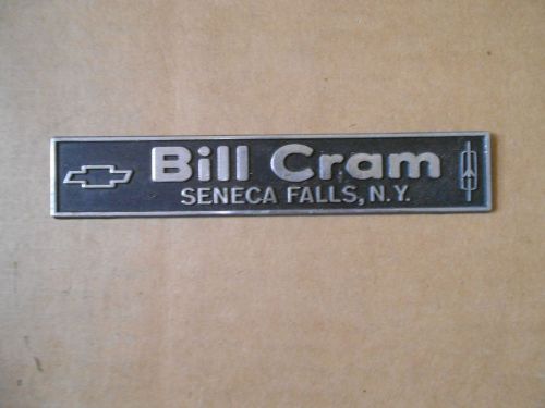 Vintage bill cram chevrolet olds seneca falls car dealer dealership metal emblem