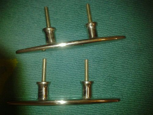 Pair of stainless steel cleats