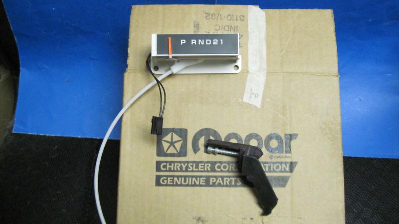 Mopar instrument panel gearshift indicator n.o.s.91-93 van models.