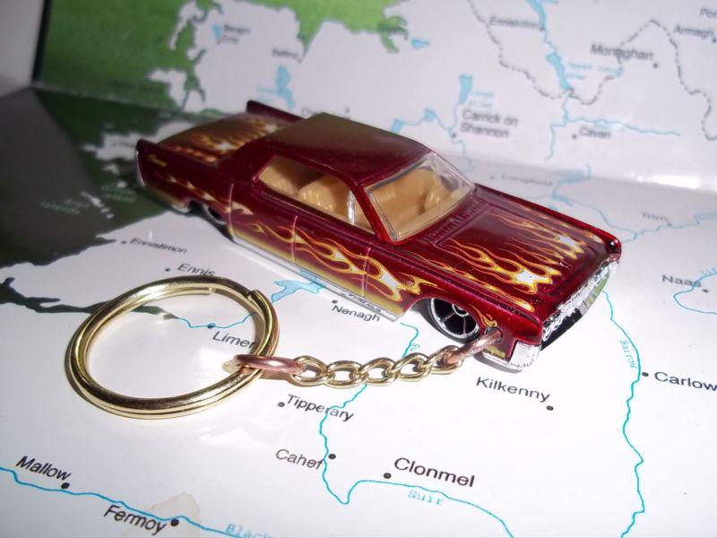 Custom mint keychain 1964 lincoln continental,red w/chrome mags