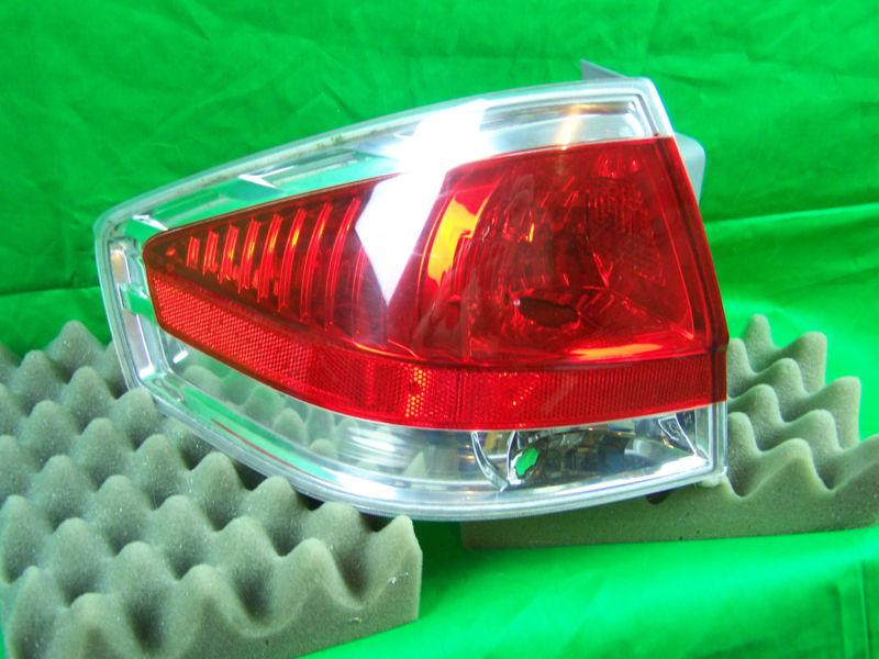 Sell USED 2008 FORD FOCUS OEM LEFT SIDE TAIL LIGHT WITH CHROME BEZEL