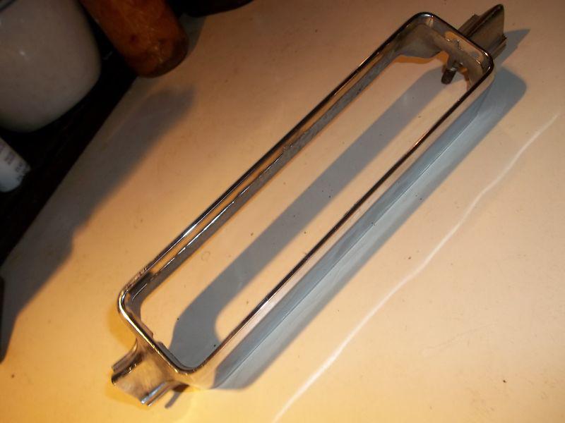 1966 cadillac fleetwood turn signal, parking light bezel 5957384 unsure of side