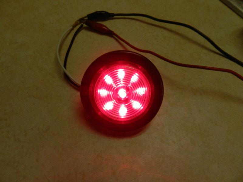 (1) clear / red 9 led light trailer 2" round,w/2 plug,grommet clearance 2.0" 
