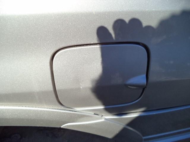 04 aerio fuel filler door 4dr 2.3l at gold 61660