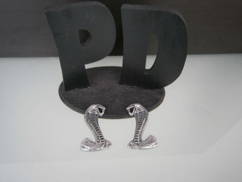 1994-1998 ford mustang cobra snake emblems (pair)  oem / warranty