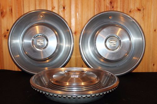Vintage set of 3 cadillac 16&#034; hubcaps good condition