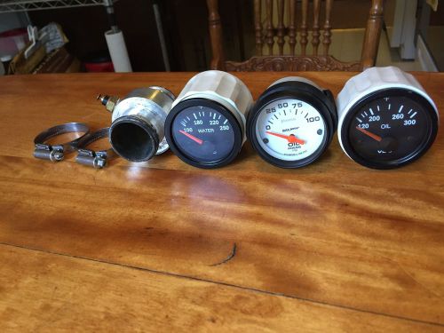 Vdo water gauge, oil gauge, water temp sensor, and autometer oil pressure gauge