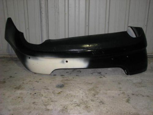 Ebony black used rear bumper off a 2009? jag. with rear sensor holes and shield