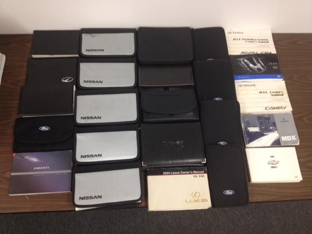 Lot of 24 oem owners manuals for late model vehicles foreign and domestic