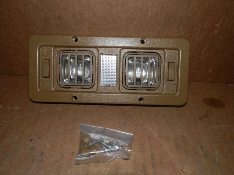 *12 volt helix interior double swivel light color: tan ( new )